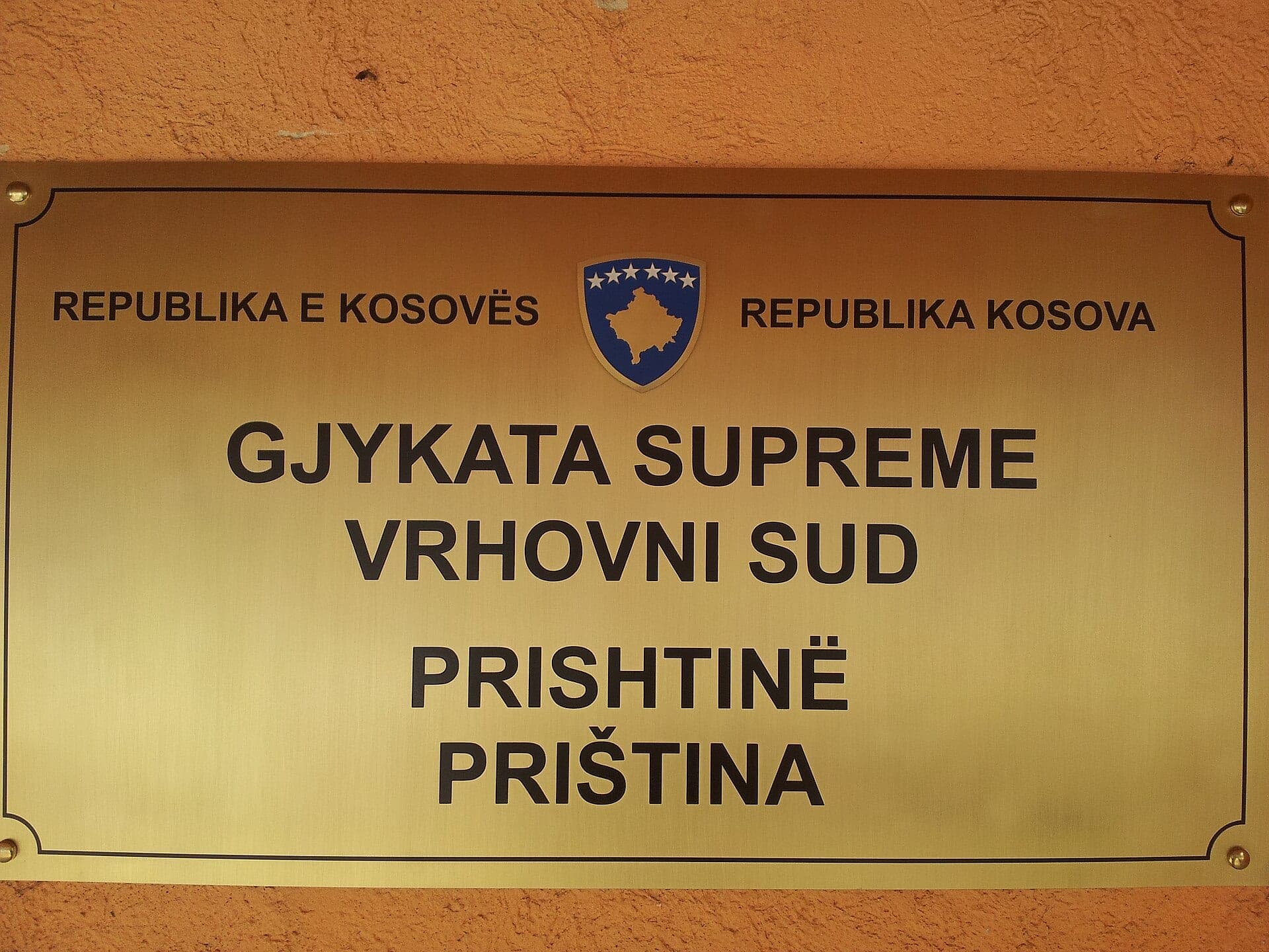 The plaque of the Supreme Court of Kosovo in Prishtina, in Albanian and Serbian